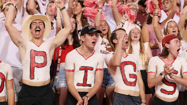 Oct 5, 2024; Fayetteville, Arkansas, USA; The Arkansas Razorbacks student section cheers during the game against the Tennessee Volunteers at Donald W. Reynolds Razorback Stadium. Arkansas won 19-14. Mandatory Credit: Nelson Chenault-Imagn Images