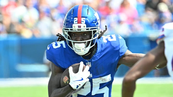 Aug 9, 2025; Orchard Park, New York, USA; New York Giants running back Dante Miller (25) carries the ball against the Buffalo Bills in the third quarter at Highmark Stadium. Aug 9, 2025; Orchard Park, New York, USA; New York Giants running back Dante Miller (25) carries the ball against the Buffalo Bills in the third quarter at Highmark Stadium.