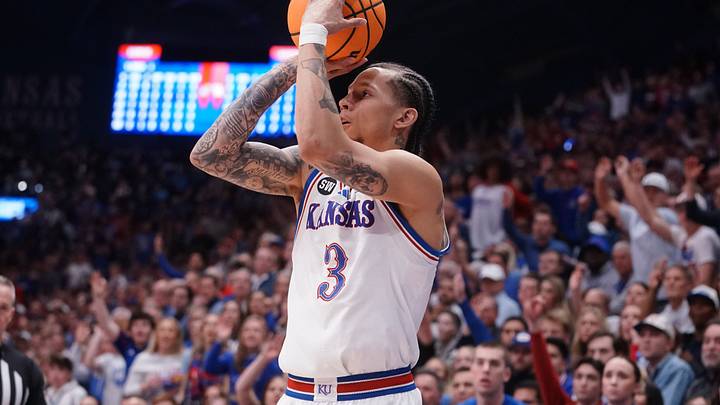 Kansas Jayhawks guard Tre White (3) lines up a three-pointer against Houston Cougars during the game inside Allen Fieldhouse on Monday, Feb. 23, 2026.