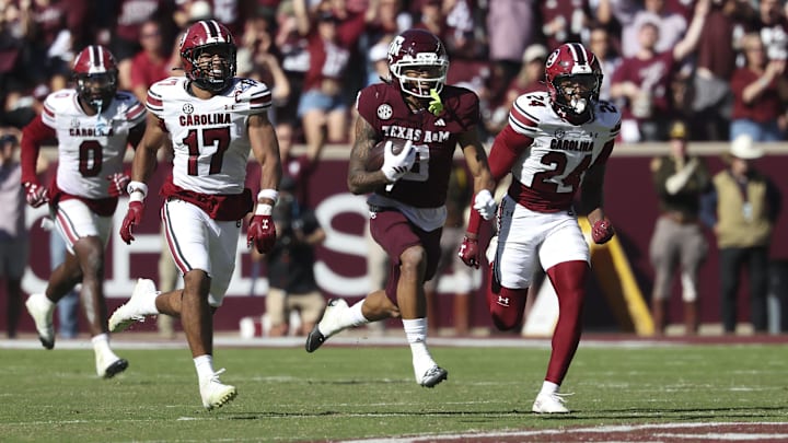 Nov 15, 2025; College Station, Texas, USA; Texas A&M Aggies wide receiver Ashton Bethel-Roman (3) runs with the ball during the third quarter against the South Carolina Gamecocks at Kyle Field. Mandatory Credit: Troy Taormina-Imagn Images
