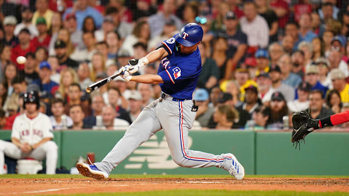 Aug 12, 2024; Boston, Massachusetts, USA; Texas Rangers shortstop Corey Seager (5) hits a two run home run against the Boston Red Sox in the seventh inning at Fenway Park. Mandatory Credit: David Butler II-Imagn Images Aug 12, 2024; Boston, Massachusetts, USA; Texas Rangers shortstop Corey Seager (5) hits a two run home run against the Boston Red Sox in the seventh inning at Fenway Park. Mandatory Credit: David Butler II-Imagn Images