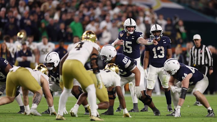 Penn State quarterback Drew Allar (15) calls a play against the Notre Dame Fighting Irish in the Orange Bowl at Hard Rock Stadium.
