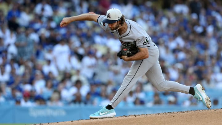 Jul 4, 2024; Los Angeles, California, USA; Arizona Diamondbacks pitcher Zac Gallen (23) throws during the first inning against the Los Angeles Dodgers at Dodger Stadium. Mandatory Credit: Jason Parkhurst-USA TODAY Sports