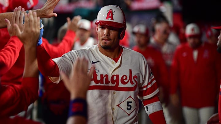 Apr 21, 2026; Anaheim, California, USA; Los Angeles Angels second baseman Vaughn Grissom (5) is greeted after hitting a sacrifice RBI against the Toronto Blue Jays during the fifth inning at Angel Stadium. Mandatory Credit: Gary A. Vasquez-Imagn Images