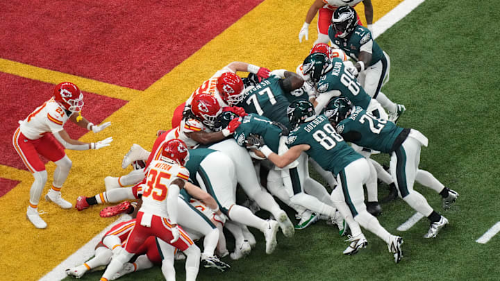Feb 9, 2025; New Orleans, LA, USA; Philadelphia Eagles quarterback Jalen Hurts (1) rushes the ball for a touchdown against the Kansas City Chiefs during the first quarter in Super Bowl LIX at Caesars Superdome. Mandatory Credit: Kirby Lee-Imagn Images