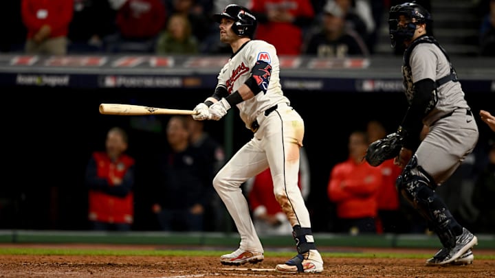 Oct 17, 2024; Cleveland, Ohio, USA; Cleveland Guardians outfielder Lane Thomas (8) doubles during the ninth inning against the New York Yankees in game 3 of the American League Championship Series at Progressive Field. Mandatory Credit: Ken Blaze-Imagn Images
