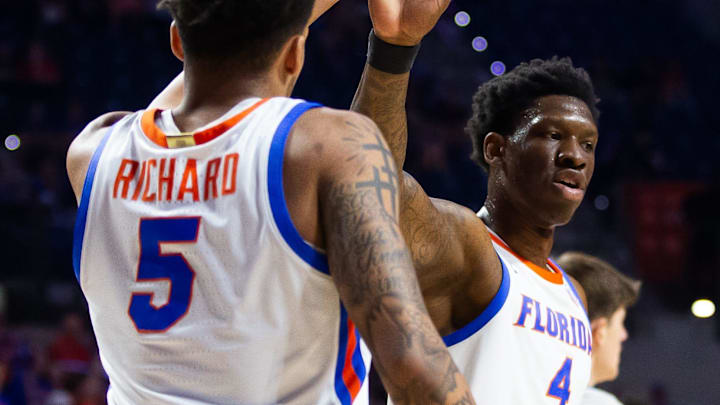Florida Gators guard Will Richard (5) gives Florida Gators forward Tyrese Samuel (4) a high-five. 