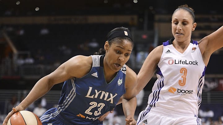 Sep 29, 2013; Phoenix, AZ, USA; Minnesota Lynx forward Maya Moore (23) drives the ball against the Phoenix Mercury guard Diana Taurasi (3) in the first half at US Airways Center. Mandatory Credit: Jennifer Stewart-Imagn Images Sep 29, 2013; Phoenix, AZ, USA; Minnesota Lynx forward Maya Moore (23) drives the ball against the Phoenix Mercury guard Diana Taurasi (3) in the first half at US Airways Center. Mandatory Credit: Jennifer Stewart-Imagn Images