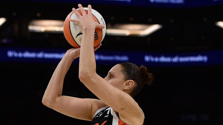 Oct 13, 2021; Phoenix, Arizona, USA; Phoenix Mercury guard Diana Taurasi (3) shoots over Chicago Sky guard Dana Evans (11) during the first half of game two of the 2021 WNBA Finals at Footprint Center. Mandatory Credit: Joe Camporeale-Imagn Images