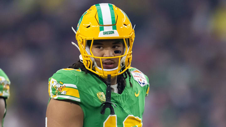 Jan 1, 2024; Glendale, AZ, USA; Oregon Ducks defensive end Matayo Uiagalelei (10) against the Liberty Flames during the 2024 Fiesta Bowl at State Farm Stadium. Mandatory Credit: Mark J. Rebilas-Imagn Images