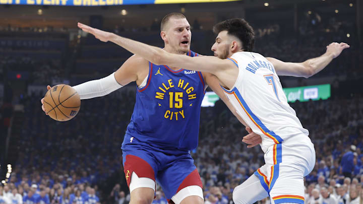 Denver Nuggets center Nikola Jokic (15) is defended by Oklahoma City Thunder forward Chet Holmgren (7) on a drive during the first quarter of game five of the second round for the 2025 NBA Playoffs at Paycom Center. Mandatory Credit: Alonzo Adams-Imagn Images Denver Nuggets center Nikola Jokic (15) is defended by Oklahoma City Thunder forward Chet Holmgren (7) on a drive during the first quarter of game five of the second round for the 2025 NBA Playoffs at Paycom Center. Mandatory Credit: Alonzo Adams-Imagn Images