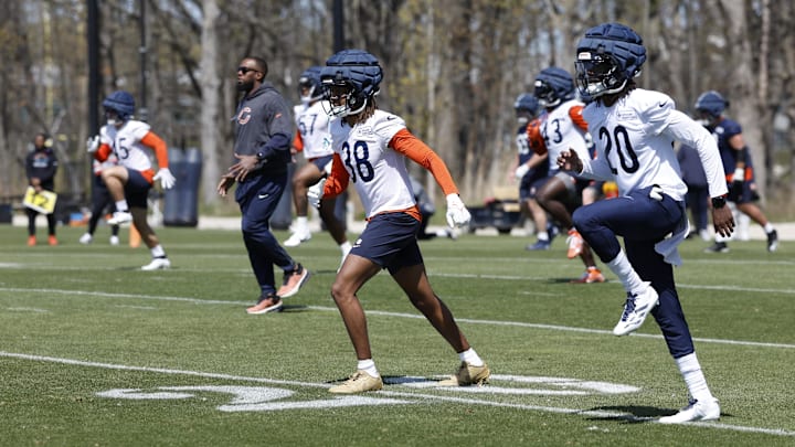 May 9, 2025; Lake Forest, IL, USA; Chicago Bears defensive backs Devin Kirkwood (38) and Zah Frazier (20) warm up during the Rookie Minicamp at Halas Hall. Mandatory Credit: Kamil Krzaczynski-Imagn Images May 9, 2025; Lake Forest, IL, USA; Chicago Bears defensive backs Devin Kirkwood (38) and Zah Frazier (20) warm up during the Rookie Minicamp at Halas Hall. Mandatory Credit: Kamil Krzaczynski-Imagn Images