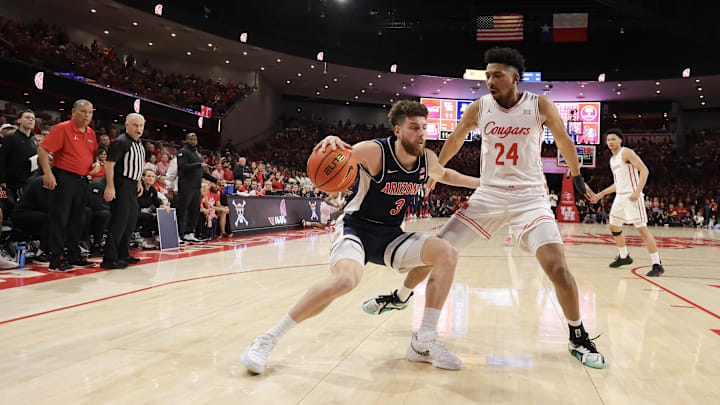 Feb 21, 2026; Houston, Texas, USA; Arizona Wildcats guard Anthony Dell'orso (3) dribbles against Houston Cougars forward Chase McCarty (24) in the first half at Fertitta Center. Mandatory Credit: Thomas Shea-Imagn Images Feb 21, 2026; Houston, Texas, USA; Arizona Wildcats guard Anthony Dell'orso (3) dribbles against Houston Cougars forward Chase McCarty (24) in the first half at Fertitta Center. Mandatory Credit: Thomas Shea-Imagn Images