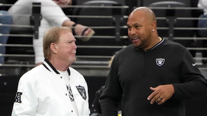 Nov 24, 2024; Paradise, Nevada, USA; Las Vegas Raiders owner Mark Davis (left) talks with coach Antonio Pierce duirng the game against the Denver Broncos at Allegiant Stadium. Mandatory Credit: Kirby Lee-Imagn Images