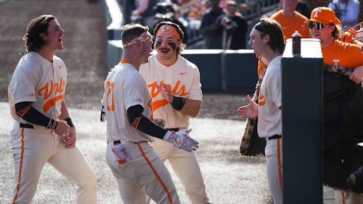 Tennessee catcher Stone Lawless (27) celebrates with the Tennessee baseball team after hitting a home run during a Tennessee baseball game against Samford at Lindsey Nelson Stadium at the University of Tennessee on Sunday, February 23, 2025.