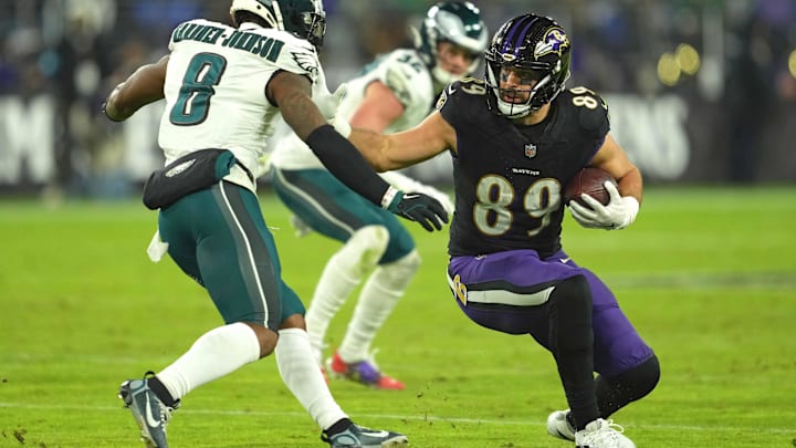 Dec 1, 2024; Baltimore, Maryland, USA; Baltimore Ravens tight end Mark Andrews (89) defended by Philadelphia Eagles safety C.J. Gardner-Johnson (8) after a third quarter catch at M&T Bank Stadium. Mandatory Credit: Mitch Stringer-Imagn Images
