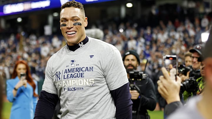 Oct 19, 2024; Cleveland, Ohio, USA; New York Yankees outfielder Aaron Judge (99) celebrates after beating the Cleveland Guardians during game five of the ALCS for the 2024 MLB playoffs at Progressive Field. Mandatory Credit: Scott Galvin-Imagn Images
