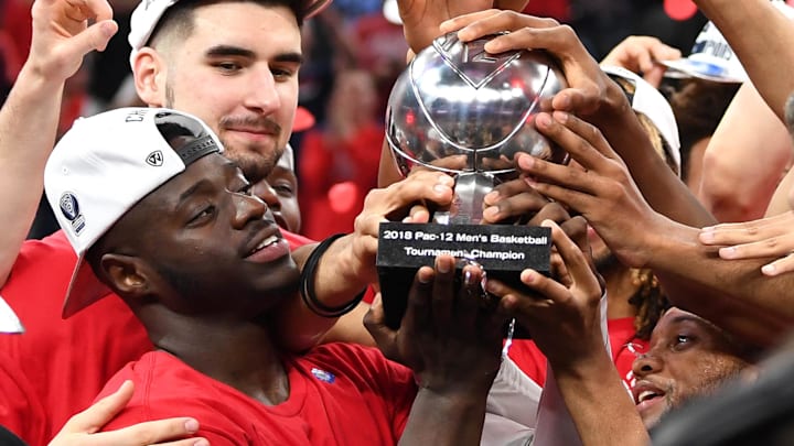 Mar 10, 2018; Las Vegas, NV, USA; Arizona Wildcats guard Rawle Alkins (1) holds the Pac-12 Tournament championship trophy after the Wildcats defeated the USC Trojans 75-61 at T-Mobile Arena. Mandatory Credit: Stephen R. Sylvanie-Imagn Images