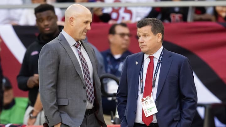 Jan 5, 2025; Glendale, Arizona, USA; Arizona Cardinals general manager Monti Ossenfort (left) with owner Michael Bidwill against the San Francisco 49ers at State Farm Stadium. Mandatory Credit: Mark J. Rebilas-Imagn Images