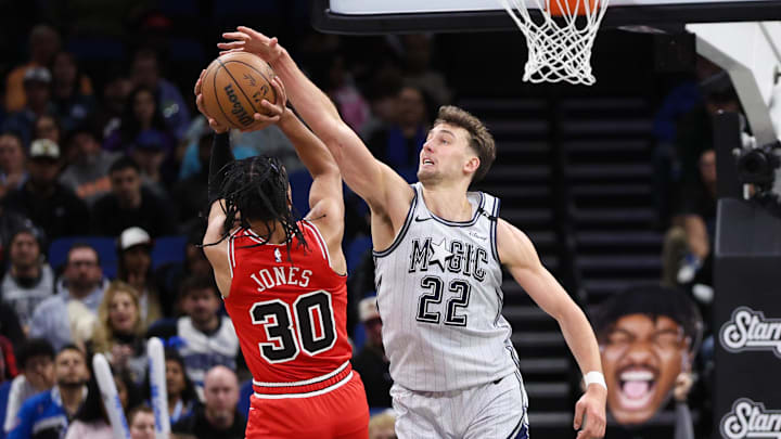 Orlando Magic forward Franz Wagner (22) blocks a shot from Chicago Bulls guard Tre Jones (30) in the second quarter at Kia Center.