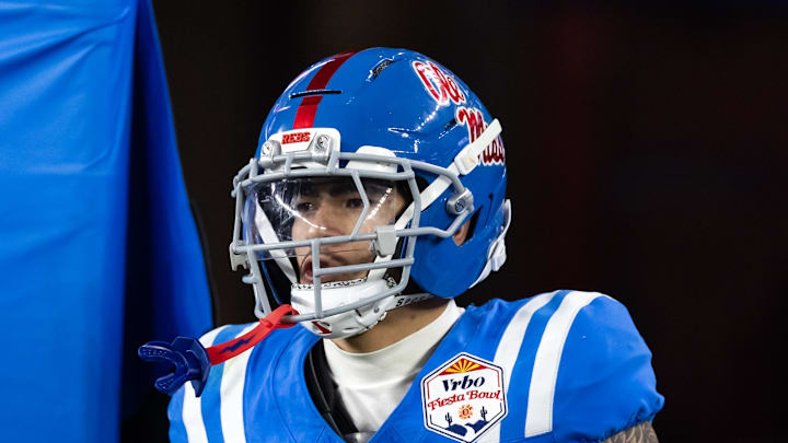 Jan 8, 2026; Glendale, AZ, USA; Mississippi Rebels safety Kapena Gushiken (14) against the Miami Hurricanes during the 2026 Fiesta Bowl and semifinal game of the College Football Playoff at State Farm Stadium. Mandatory Credit: Mark J. Rebilas-Imagn Images Jan 8, 2026; Glendale, AZ, USA; Mississippi Rebels safety Kapena Gushiken (14) against the Miami Hurricanes during the 2026 Fiesta Bowl and semifinal game of the College Football Playoff at State Farm Stadium. Mandatory Credit: Mark J. Rebilas-Imagn Images