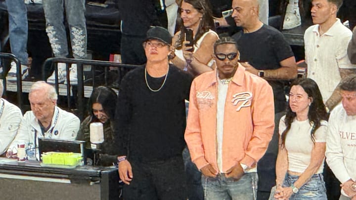 Minnesota Vikings quarterback J.J. McCarthy, left, and wide receiver Justin Jefferson attend Game 5 of a Western Conference semifinal between the Minnesota Timberwolves and Golden State Warriors on Wednesday, May 14, 2025, at Target Center in Minneapolis.