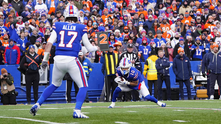 Jan 12, 2025; Orchard Park, New York, USA; Buffalo Bills wide receiver Khalil Shakir (10) catches a pass from quarterback Josh Allen (17) during the fourth quarter against the Denver Broncos in an AFC wild card game at Highmark Stadium. Mandatory Credit: Gregory Fisher-Imagn Images