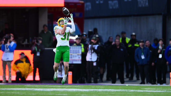 Oregon Ducks defensive back Dillon Thieneman (31) intercepts a pass against the Washington Huskies Oregon Ducks defensive back Dillon Thieneman (31) intercepts a pass against the Washington Huskies