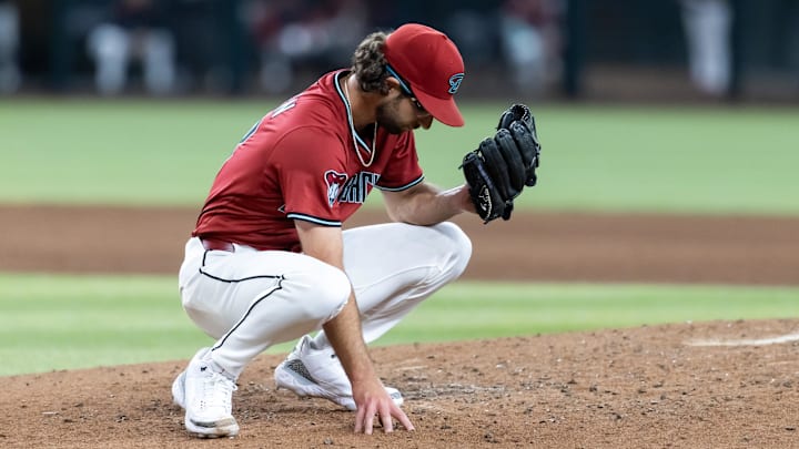 Phoenix, Arizona, USA; Arizona Diamondbacks pitcher Zac Gallen reacts against the Pittsburgh Pirates at Chase Field.
