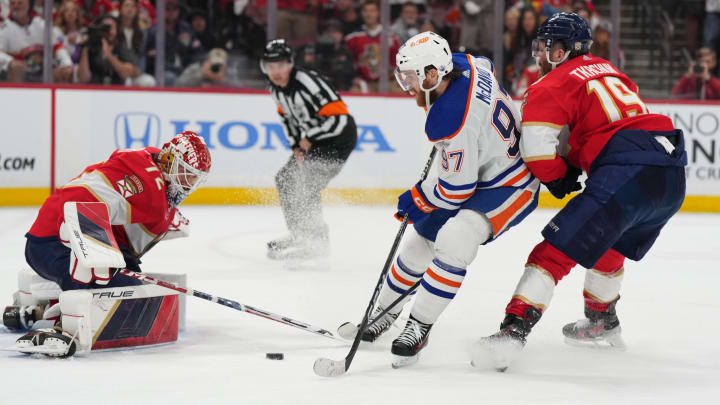 Jun 10, 2024; Sunrise, Florida, USA; Florida Panthers defenseman Brandon Montour (62) and Edmonton Oilers forward Evander Kane (91) fight during the third period in game two of the 2024 Stanley Cup Final at Amerant Bank Arena. Mandatory Credit: Jim Rassol-USA TODAY Sports