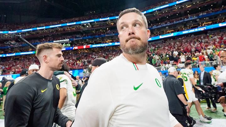 Oregon head coach Dan Lanning walks off the field after the Ducks’ loss as the Oregon Ducks face the Indiana Hoosiers in the Peach Bowl on Jan. 9, 2026, at Mercedes-Benz Stadium in Atlanta, Georgia. Oregon head coach Dan Lanning walks off the field after the Ducks’ loss as the Oregon Ducks face the Indiana Hoosiers in the Peach Bowl on Jan. 9, 2026, at Mercedes-Benz Stadium in Atlanta, Georgia.