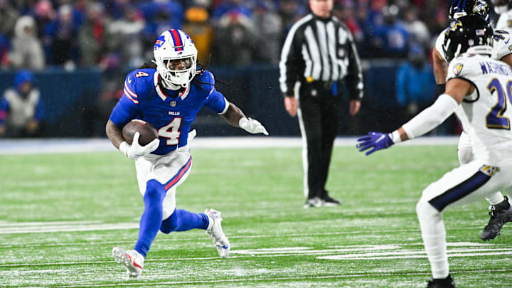 Jan 19, 2025; Orchard Park, New York, USA; Buffalo Bills running back James Cook (4) runs the ball during the first quarter against the Baltimore Ravens in a 2025 AFC divisional round game at Highmark Stadium. Mandatory Credit: Mark Konezny-Imagn Images Jan 19, 2025; Orchard Park, New York, USA; Buffalo Bills running back James Cook (4) runs the ball during the first quarter against the Baltimore Ravens in a 2025 AFC divisional round game at Highmark Stadium. Mandatory Credit: Mark Konezny-Imagn Images