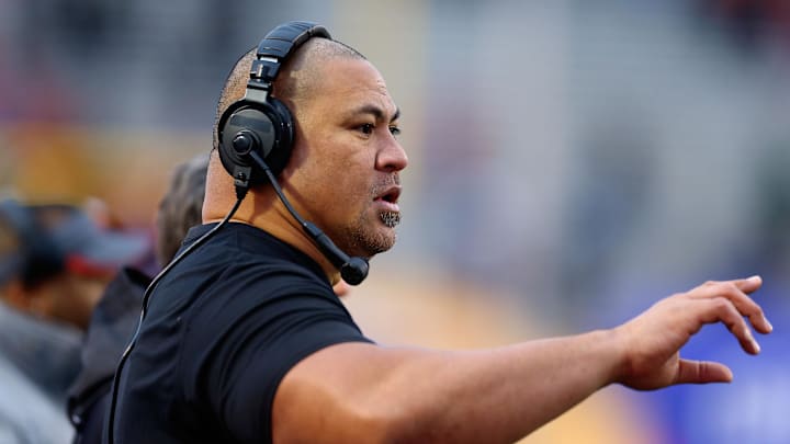 Dec 21, 2013; Albuquerque, NM, USA; Washington State Cougars defensive line coach Joe Salave'a reacts against the Colorado State Rams during the Gildan New Mexico Bowl at University Stadium. Mandatory Credit: Mark J. Rebilas-Imagn Images Dec 21, 2013; Albuquerque, NM, USA; Washington State Cougars defensive line coach Joe Salave'a reacts against the Colorado State Rams during the Gildan New Mexico Bowl at University Stadium. Mandatory Credit: Mark J. Rebilas-Imagn Images