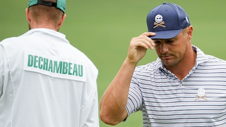 Apr 11, 2024; Augusta, Georgia, USA; Bryson DeChambeau tips his hat after putting on no. 2 during