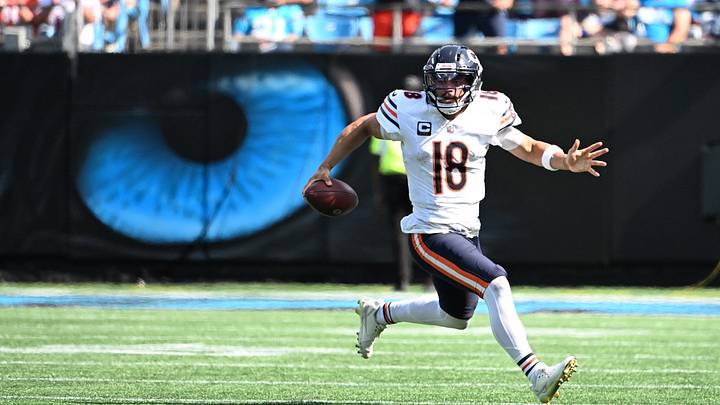 Chicago Bears quarterback Caleb Williams (18) runs with the ball in the fourth quarter against the Carolina Panthers at Bank of America Stadium. Mandatory Credit: Bob Donnan-Imagn Images Chicago Bears quarterback Caleb Williams (18) runs with the ball in the fourth quarter against the Carolina Panthers at Bank of America Stadium. Mandatory Credit: Bob Donnan-Imagn Images