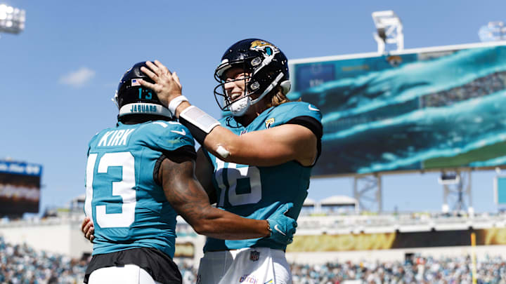 Oct 15, 2023; Jacksonville, Florida, USA; Jacksonville Jaguars quarterback Trevor Lawrence (16) and