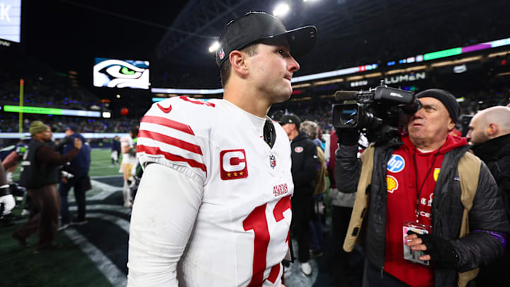 Jan 17, 2026; Seattle, WA, USA;  San Francisco 49ers quarterback Brock Purdy (13) leaves the field following an NFC Divisional Round game against the Seattle Seahawks at Lumen Field. Mandatory Credit: Kevin Ng-Imagn Images