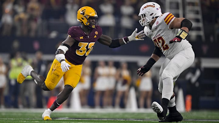 Dec 7, 2024; Arlington, TX, USA; Arizona State Sun Devils defensive lineman Prince Dorbah (32) and Iowa State Cyclones offensive lineman Jalen Travis (72) in action during the game between the Iowa State Cyclones and the Arizona State Sun Devils at AT&T Stadium. Mandatory Credit: Jerome Miron-Imagn Images