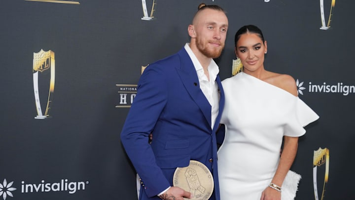 George Kittle and Claire Kittle on the red carpet before Super Bowl LIX NFL Honors at Saenger Theatre.
