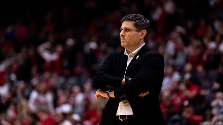 Cincinnati Bearcats head coach Wes Miller looks on in the first half of the NCAA Basketball game between Louisville Cardinals and Cincinnati Bearcats at Heritage Bank Center in Cincinnati on Nov. 21, 2025. Cincinnati Bearcats head coach Wes Miller looks on in the first half of the NCAA Basketball game between Louisville Cardinals and Cincinnati Bearcats at Heritage Bank Center in Cincinnati on Nov. 21, 2025.