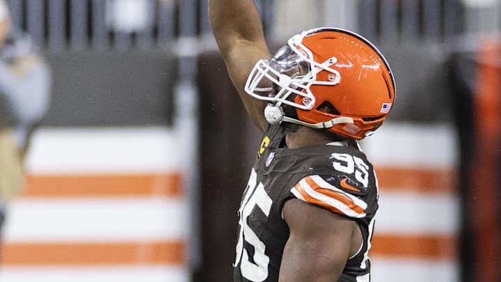 Dec 29, 2024; Cleveland, Ohio, USA; Cleveland Browns defensive end Myles Garrett (95) celebrates his sack against the Miami Dolphins during the third quarter at Huntington Bank Field. Mandatory Credit: Scott Galvin-Imagn Images