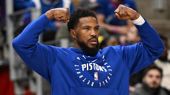 Feb 9, 2025; Detroit, Michigan, USA; Detroit Pistons guard Malik Beasley (5) celebrates on the bench after the Pistons made a three-point shot against the Charlotte Hornets in the second quarter at Little Caesars Arena. Mandatory Credit: Lon Horwedel-Imagn Images