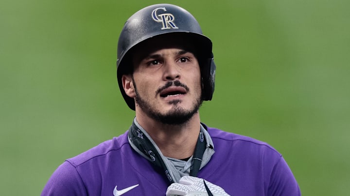 Sep 18, 2020; Denver, Colorado, USA; Colorado Rockies third baseman Nolan Arenado (28) reacts after striking out against the Los Angeles Dodgers in the first inning at Coors Field