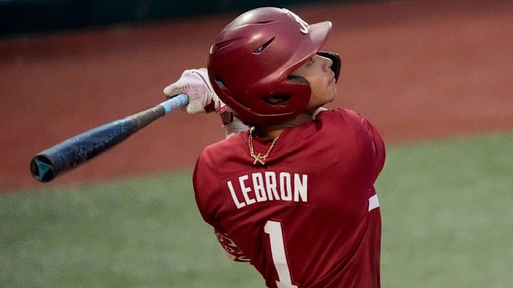 Feb 14, 2025; Tuscaloosa, AL, USA; Justin Lebron drives in a run with a sacrifice fly during Alabama baseball’s opening day at Sewell-Thomas Stadium against Bradley. The Crimson Tide defeated Bradley 10-6.