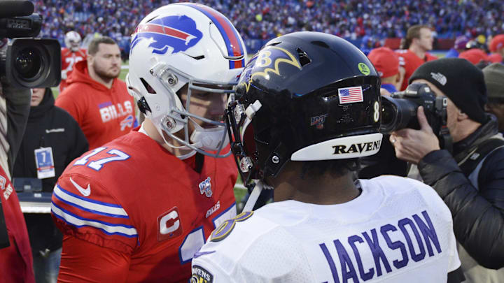 Dec 8, 2019; Orchard Park, NY, USA; Buffalo Bills quarterback Josh Allen (17) meets Baltimore Ravens quarterback Lamar Jackson (8) at mid-field after a game at New Era Field.