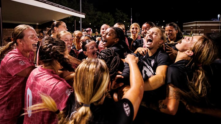 Mississippi State's soccer team celebrates after beating No. 1 Tennessee on Friday at MSU Soccer Field, 3-2.