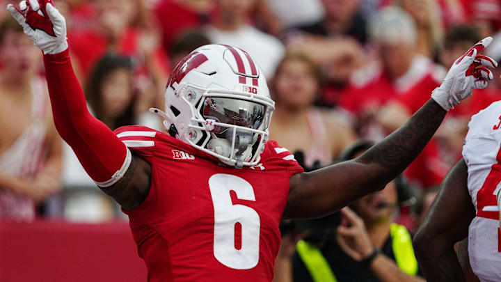 Omillio Agard with the Wisconsin Badgers