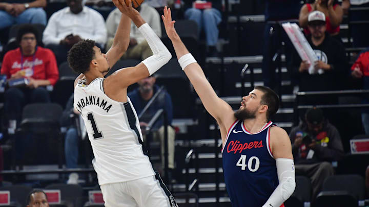Nov 4, 2024; Inglewood, California, USA;  San Antonio Spurs center Victor Wembanyama (1) shoots against Los Angeles Clippers center Ivica Zubac (40) during the first half at Intuit Dome. Mandatory Credit: Gary A. Vasquez-Imagn Images