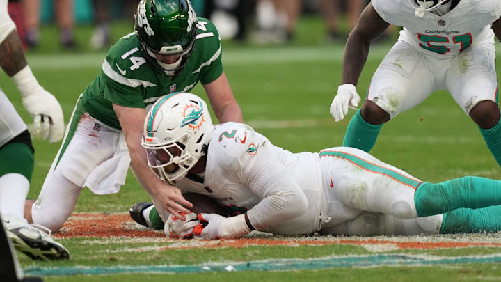 Miami Dolphins linebacker Bradley Chubb (2) recovers a fumble after knocking the ball loose from New York Jets quarterback Trevor Siemian (14) during the second half of an NFL game at Hard Rock Stadium in Miami Gardens, Dec. 17, 2023. Miami Dolphins linebacker Bradley Chubb (2) recovers a fumble after knocking the ball loose from New York Jets quarterback Trevor Siemian (14) during the second half of an NFL game at Hard Rock Stadium in Miami Gardens, Dec. 17, 2023.