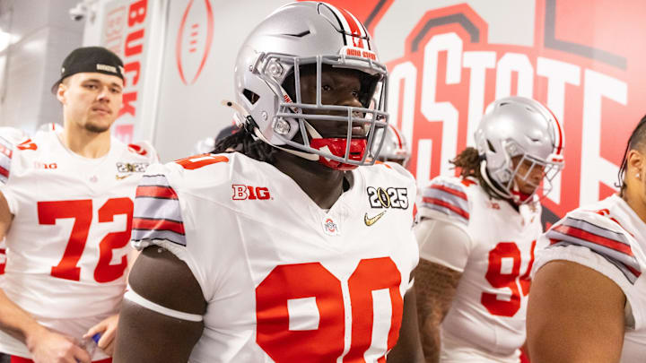 Jan 20, 2025; Atlanta, GA, USA; Ohio State Buckeyes defensive lineman Eric Mensah (90) against the Notre Dame Fighting Irish during the CFP National Championship college football game at Mercedes-Benz Stadium. Mandatory Credit: Mark J. Rebilas-Imagn Images